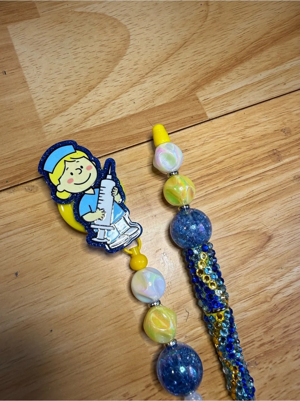 Peanuts Sally Nurse Blue Rhinestone Beaded Pen and Matching Badge Reel Set